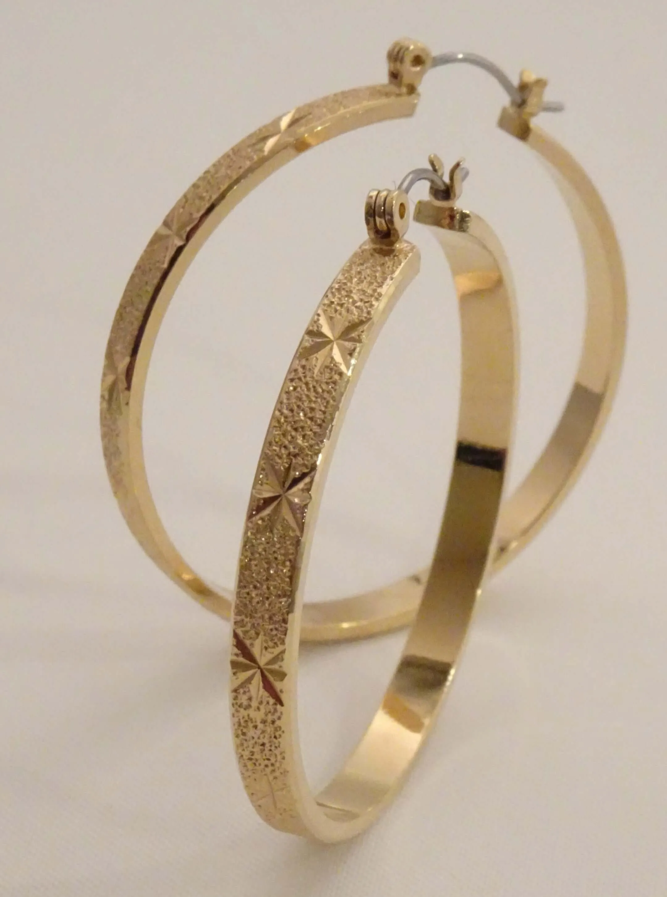 The Etched Starburst Hoop Earrings