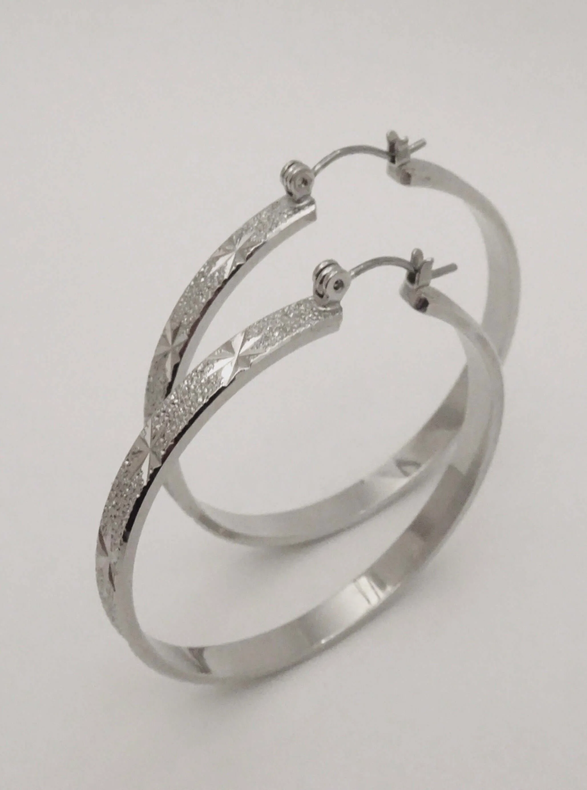 The Etched Starburst Hoop Earrings